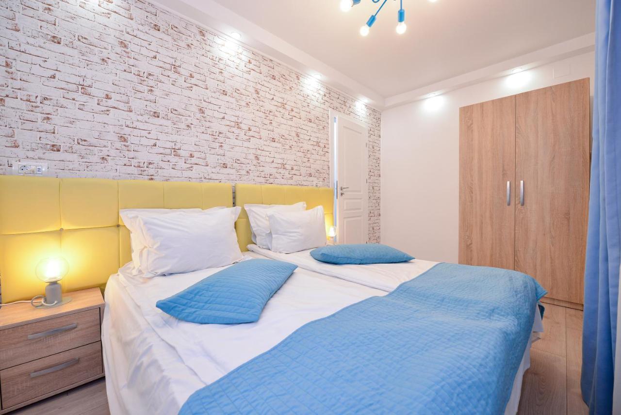 Tower By Grand Accommodation Bukares Bagian luar foto