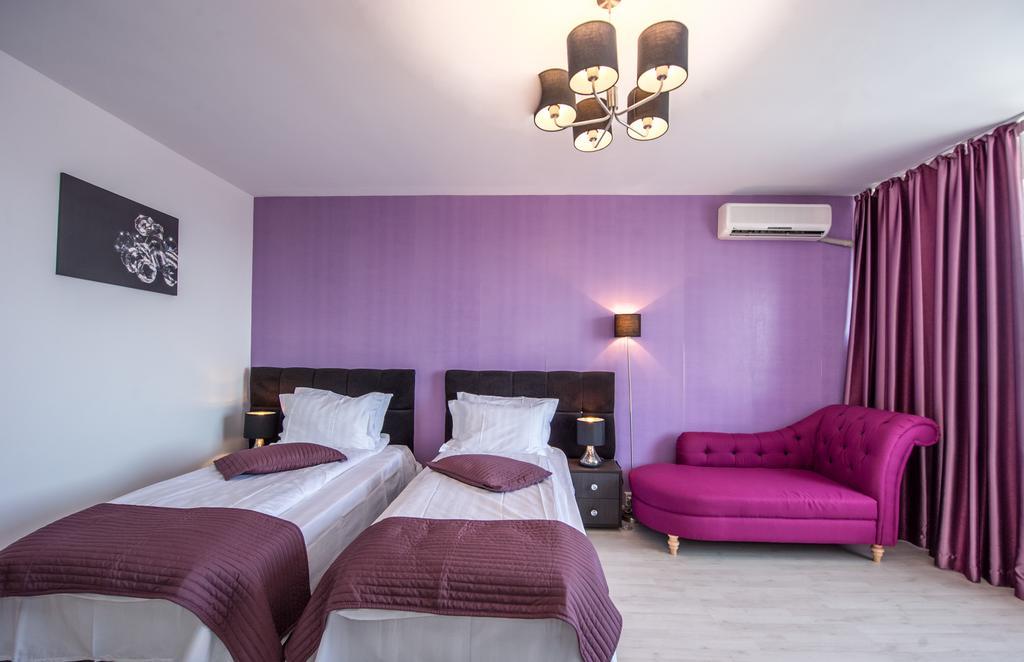 Tower By Grand Accommodation Bukares Bagian luar foto